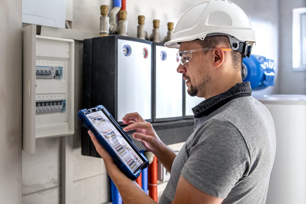oung engineer adjusting autonomous heating