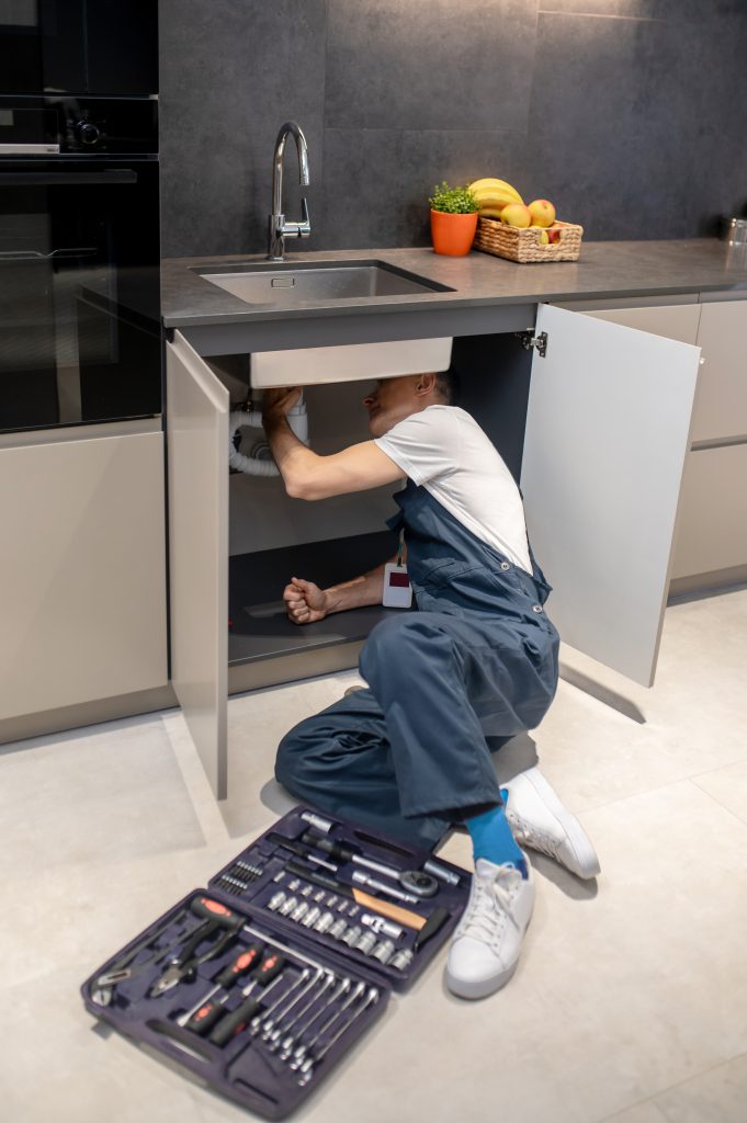 oung engineer adjusting autonomous heating