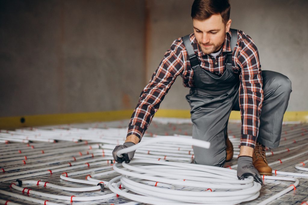 oung engineer adjusting autonomous heating